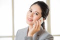 Smiling Business asian Woman talking on a Mobile phone Royalty Free Stock Photo