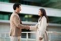 Business Associates Man And Woman Greet Each Other Warmly Royalty Free Stock Photo