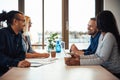 Laughing young African American businesswoman in a meeting with Royalty Free Stock Photo