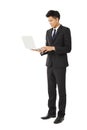 Smiling business man holding laptop Royalty Free Stock Photo