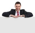 Smiling business man showing blank signboard Royalty Free Stock Photo