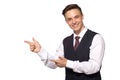 Smiling business man in a vest pointing with his fingers Royalty Free Stock Photo