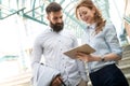 Smiling business man and woman chatting outdoor Royalty Free Stock Photo