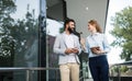 Smiling business man and woman chatting outdoor Royalty Free Stock Photo