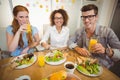 Smiling business people having breakfast Royalty Free Stock Photo