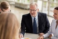 Smiling business people meeting in office Royalty Free Stock Photo