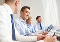 Smiling business people meeting in office Royalty Free Stock Photo