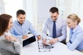 Smiling business people meeting in office Royalty Free Stock Photo