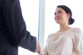 Smiling business people shaking hands at office Royalty Free Stock Photo