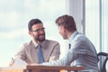 Smiling business people signing a contract Royalty Free Stock Photo