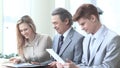 Smiling business team checking financial data.photo with copy space Royalty Free Stock Photo