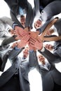 Smiling business team standing in circle hands together Royalty Free Stock Photo