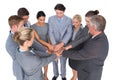 Smiling business team standing in circle hands together Royalty Free Stock Photo