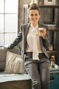 Smiling business woman with coffee latte Royalty Free Stock Photo