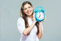 Smiling business woman hold alarm clock. Royalty Free Stock Photo