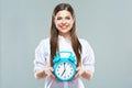 Smiling business woman hold alarm clock. Royalty Free Stock Photo