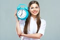 Smiling business woman hold alarm clock. Royalty Free Stock Photo