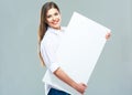 Smiling business woman hold big white blank sign board. Royalty Free Stock Photo