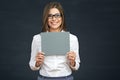 Smiling business woman holding blank sign board. Royalty Free Stock Photo