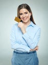 Smiling business woman holding credit card. Royalty Free Stock Photo