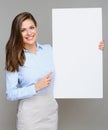 Business woman holding white big sign board and pointing finger Royalty Free Stock Photo