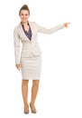 Smiling business woman pointing on copy space Royalty Free Stock Photo