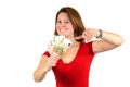 Smiling business woman pointing at euro bills