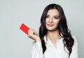 Smiling business woman with red blank card. Royalty Free Stock Photo