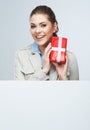 Smiling business woman red gift box hold. Royalty Free Stock Photo