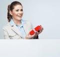 Smiling business woman red gift box hold. Royalty Free Stock Photo