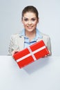 Smiling business woman red gift box hold Royalty Free Stock Photo