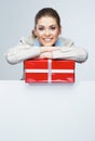 Smiling business woman red gift box hold. Royalty Free Stock Photo