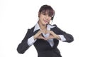 Smiling Business woman showing hand in love sign, heart shape. C