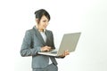 Smiling business woman standing holding laptop Royalty Free Stock Photo