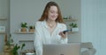 Smiling business woman talking mobile phone at home office. Portrait of joyful girl making phone call at remote Royalty Free Stock Photo