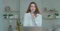 Smiling business woman talking mobile phone at home office. Portrait of joyful girl making phone call at remote Royalty Free Stock Photo