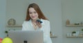 Smiling business woman talking mobile phone at home office. Portrait of joyful girl making phone call at remote Royalty Free Stock Photo