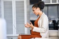 Pregnant african business woman doing video call at office Royalty Free Stock Photo