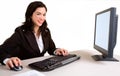 Smiling Business Woman Working on a Computer Royalty Free Stock Photo