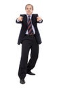 Smiling Businessman with hands pointing