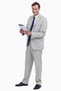 Smiling businessman with his tablet computer Royalty Free Stock Photo