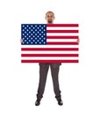 Smiling businessman holding a big card, flag of the United State Royalty Free Stock Photo