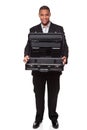 Smiling businessman holding empty open briefcase