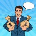 Smiling Businessman Holding Money Bags. Pop Art