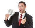 Smiling businessman holding money Royalty Free Stock Photo