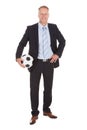 Smiling Businessman Holding Soccer Ball Royalty Free Stock Photo