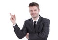 Smiling businessman pointing copy space. Royalty Free Stock Photo