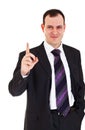 Smiling businessman raise finger up