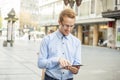 Smiling Businessman with tablet on street Royalty Free Stock Photo