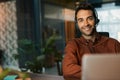 Smiling businessman talking on a headset in his office Royalty Free Stock Photo